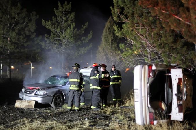 Firefighters at a car crash