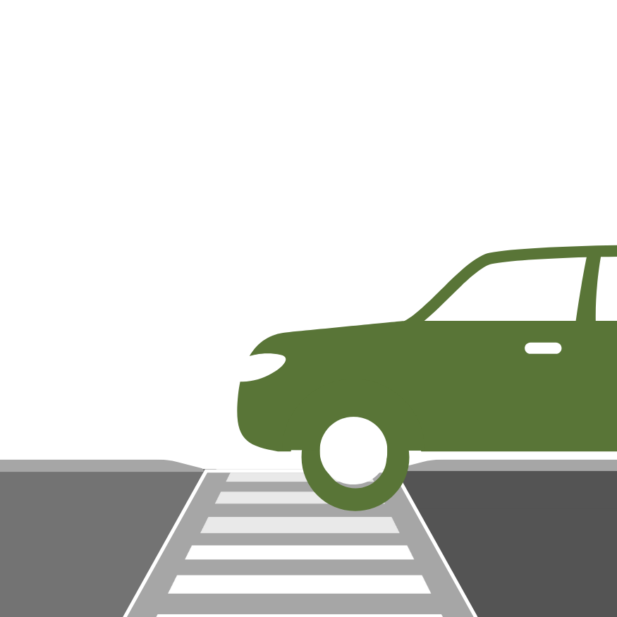 The front bumper and tire of a vehicle are parked in the crosswalk